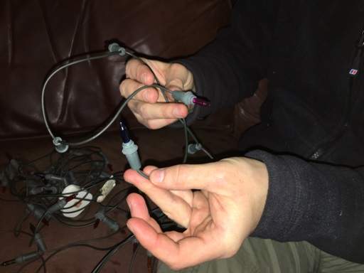 Inspecting Christmas tree light connections